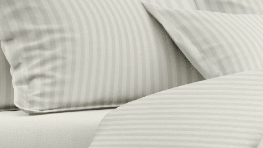 Een elegante slaapkamer met Satin d’Or