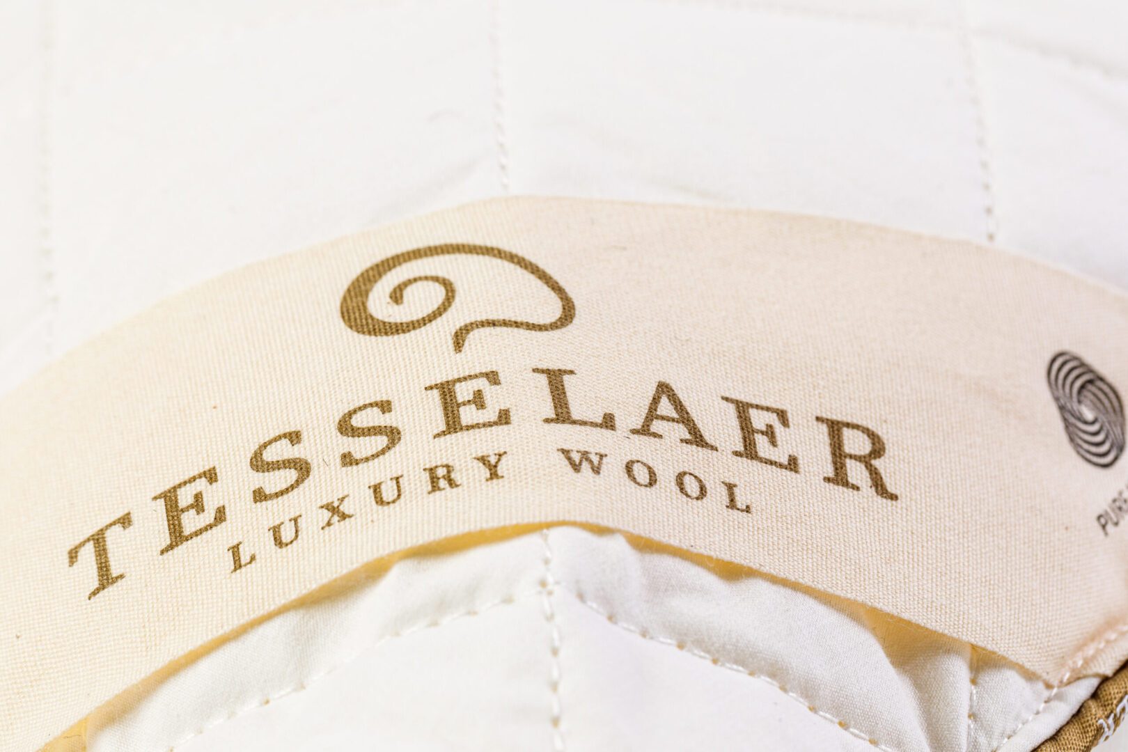 Tesselaer beddengoed Woolmark