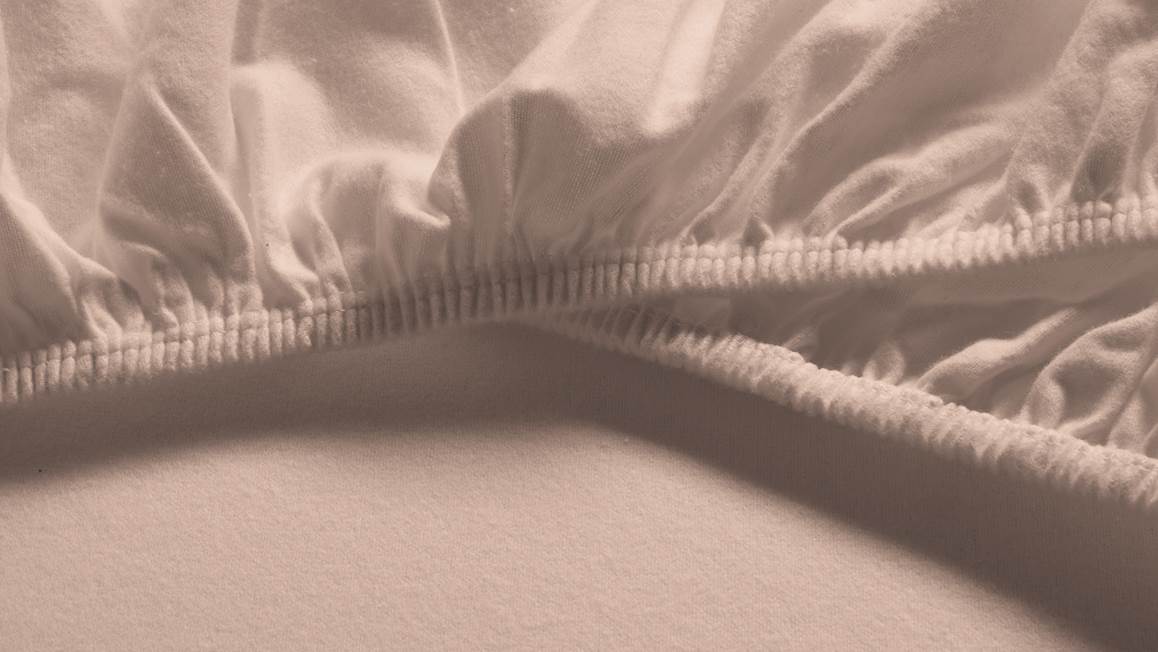 Snoozing flanel topper hoeslaken