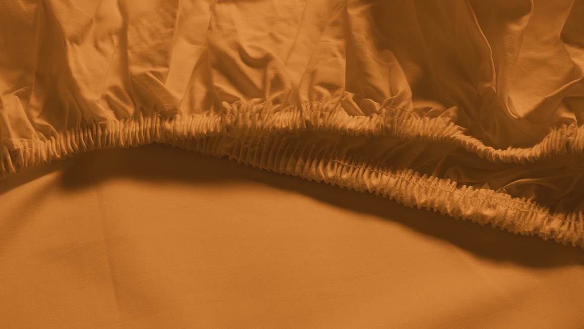 Snoozing percale katoen topper hoeslaken