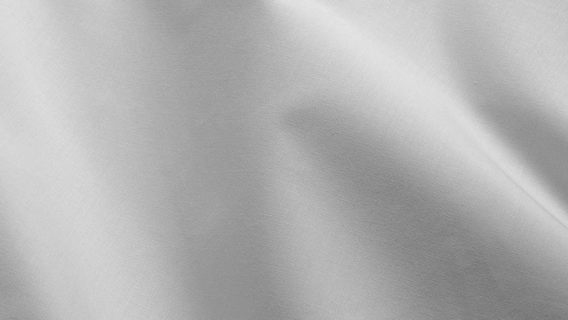 Snoozing percale katoen topper hoeslaken
