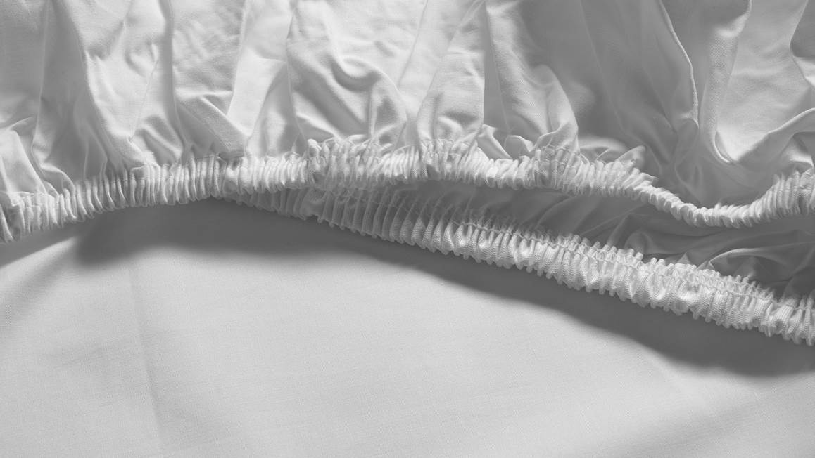 Snoozing percale katoen topper hoeslaken