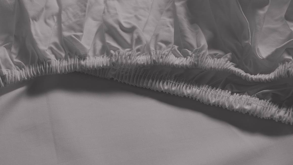 Snoozing percale katoen hoeslaken