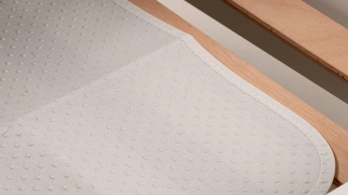 Snoozing antislip kindermatrasonderlegger