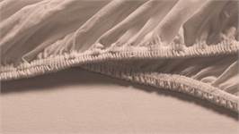 Snoozing jersey topper hoeslaken